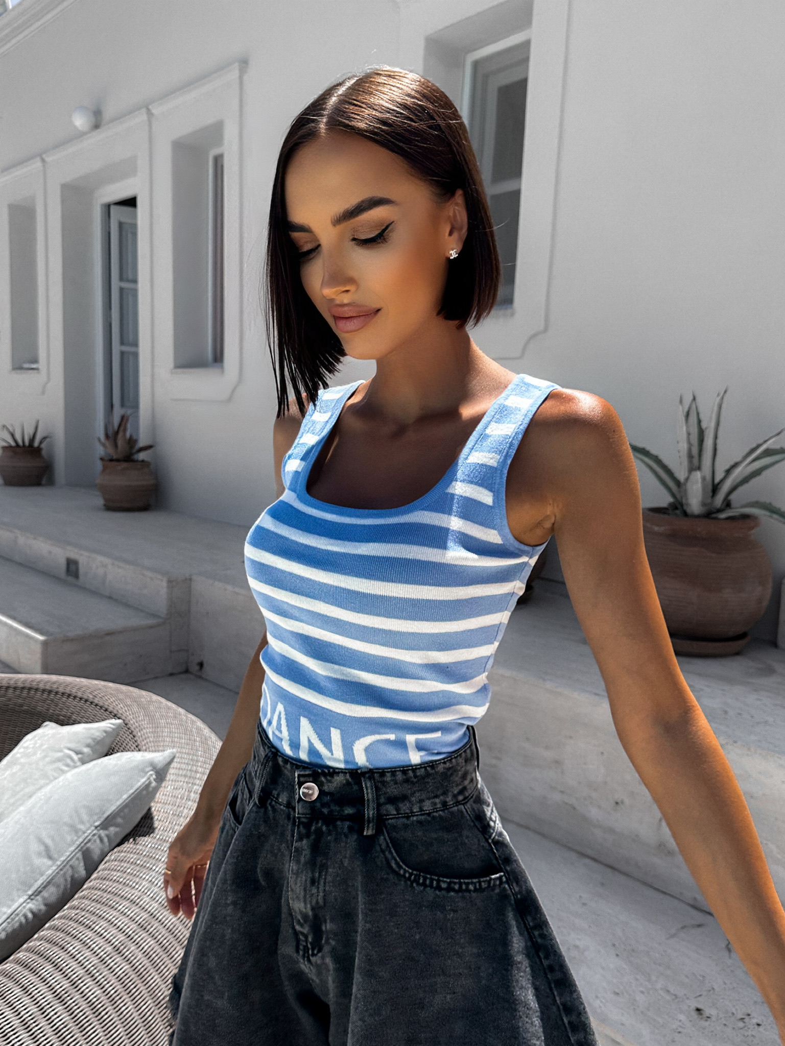 Světle modrý crop top SPREG s nápisem Velikost: S/M