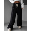 Černé elegantní široké kalhoty SOFIER s tkaničkou