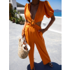 Oranžový overal ASTILY s průstřihy