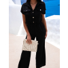 Černý elegantní overal SHOWINESS s knoflíky